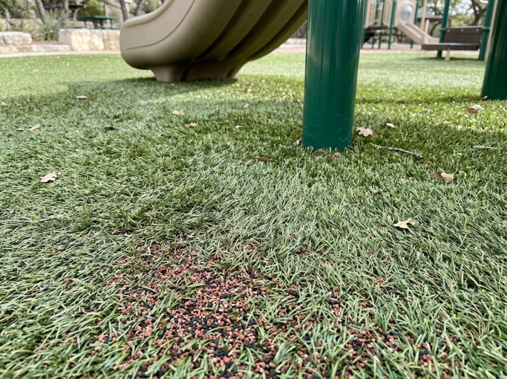 PlayZone Supreme Turf artificial turf installed in a San Antonio, TX play area with clean seams and trimmed edges.